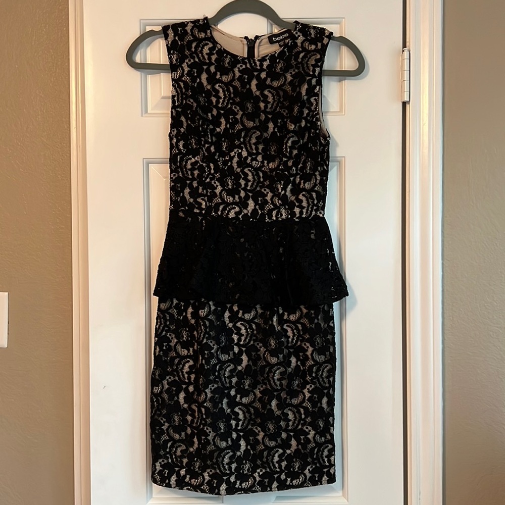 Bebe black lace/nude peplum dress size XS NWOT